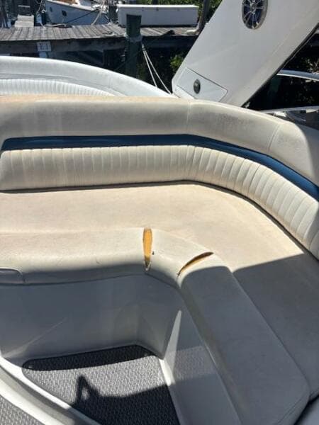2007 Monterey 350 Sport Yacht seating with visible wear and tear.