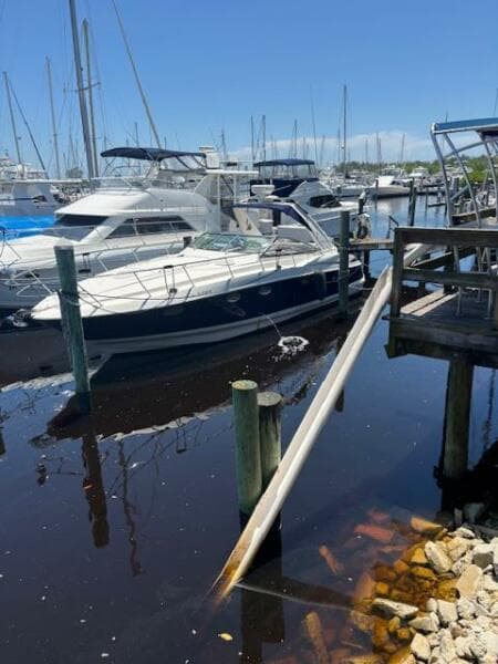 2007 Monterey 350 Sport Yacht docked at a marina with other boats.