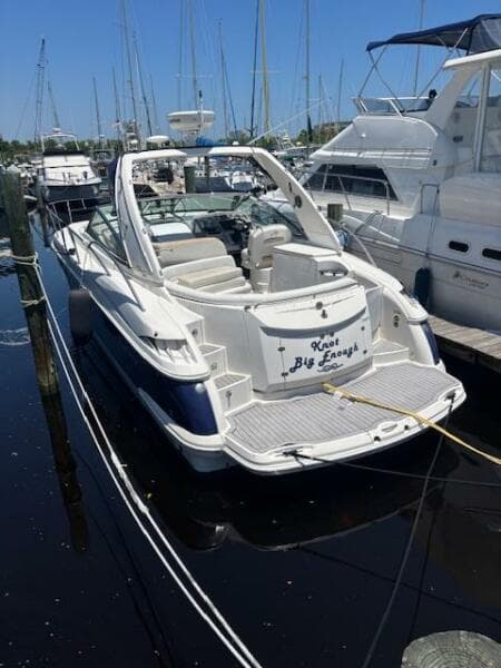 2007 Monterey 350 Sport Yacht docked at marina, sunny day, rear view.