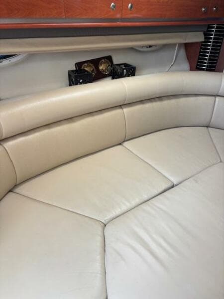 Interior seating of 2007 Monterey 350 Sport Yacht with beige leather upholstery.