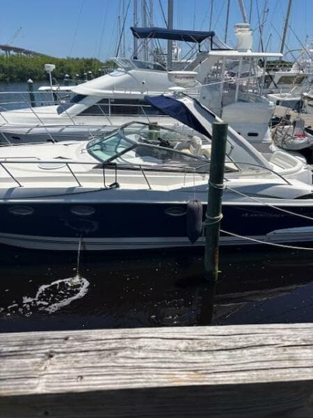 2007 Monterey 350 Sport Yacht docked at marina, side view.