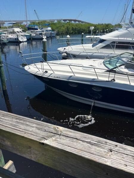 2007 Monterey 350 Sport Yacht docked in a marina with other boats.