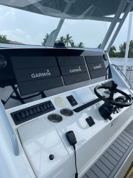 2018 Regulator 41 boat helm with Garmin navigation displays and controls.
