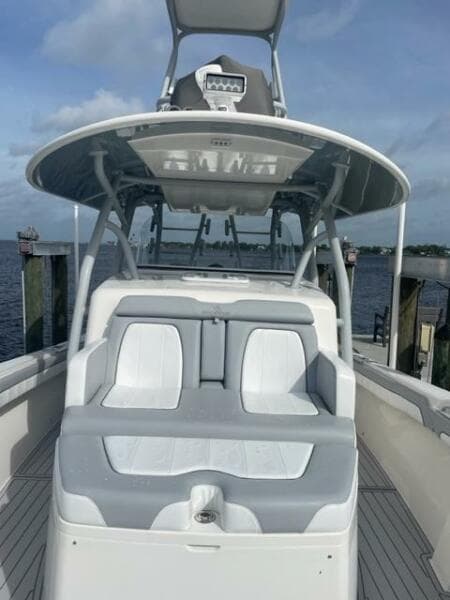 2018 Regulator 41 boat docked, featuring spacious seating and sleek design.