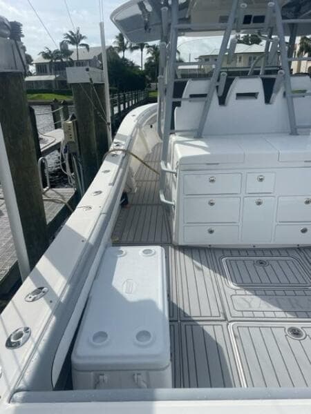 2018 Regulator 41 boat with spacious deck and storage, docked at marina.