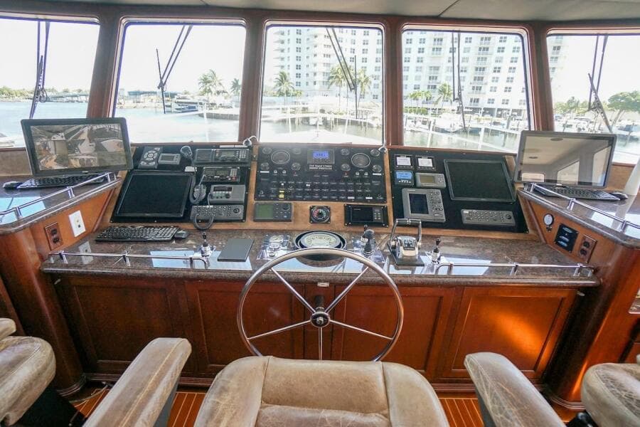 Control room of 1996 ABD 90 Explorer yacht with navigation equipment and monitors.