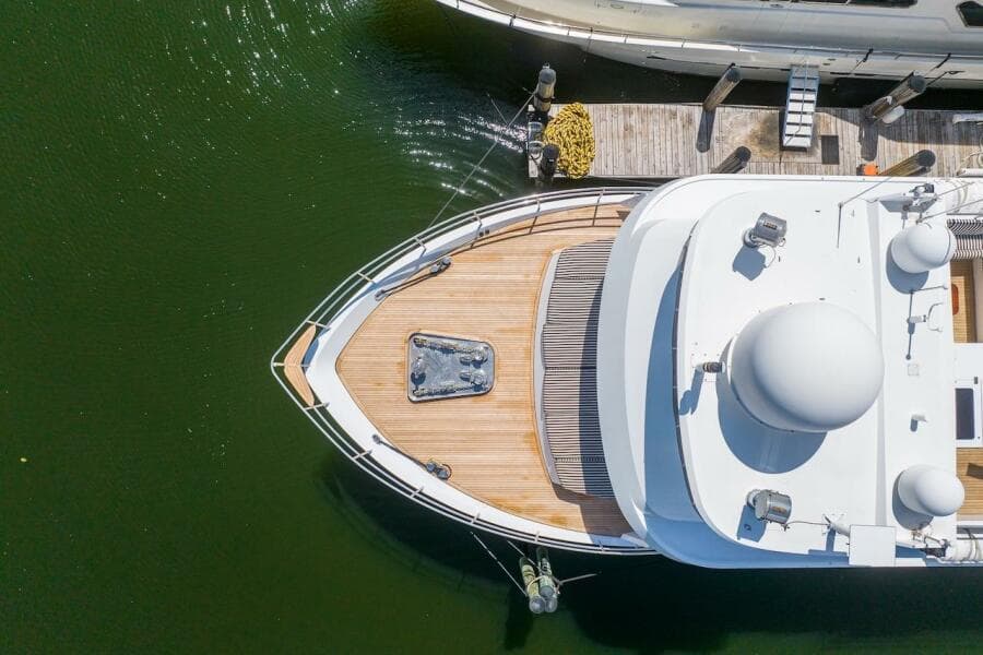 Aerial view of 1996 ABD 90 Explorer yacht docked at marina.