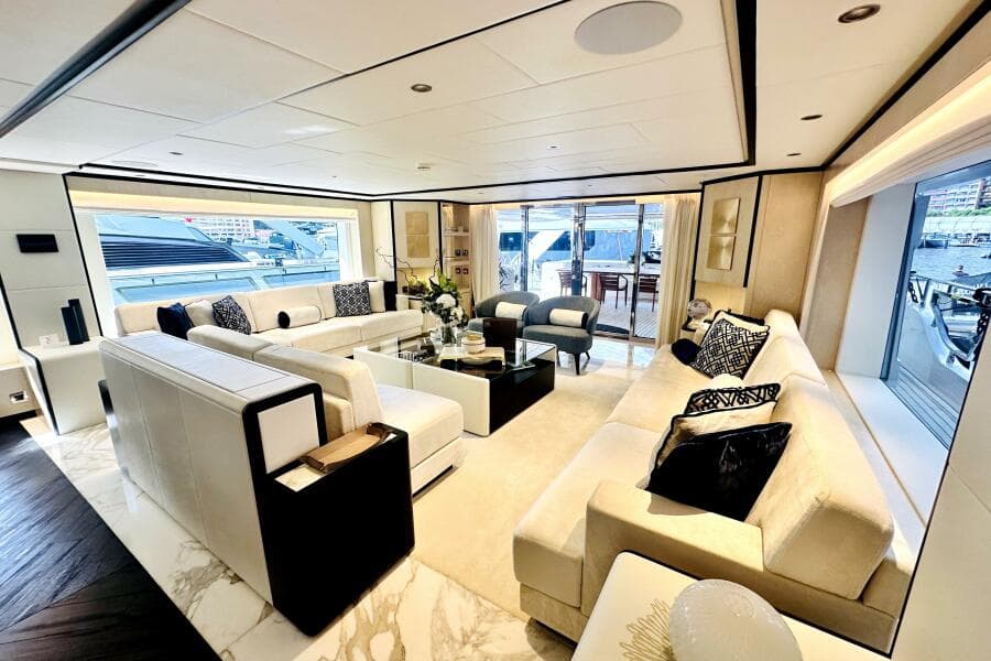 Luxurious interior of 2023 Majesty 120 yacht with elegant seating and modern decor.