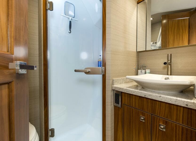 2016 92 Viking Enclosed Bridge Touche Captain's Stateroom Head