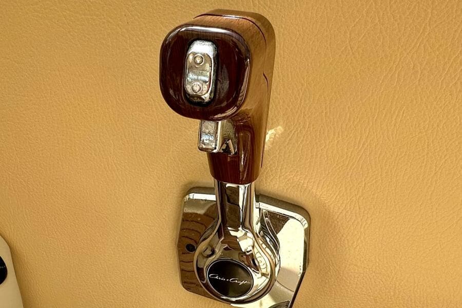 Chrome throttle lever on 2013 Chris-Craft Corsair 22 boat interior.