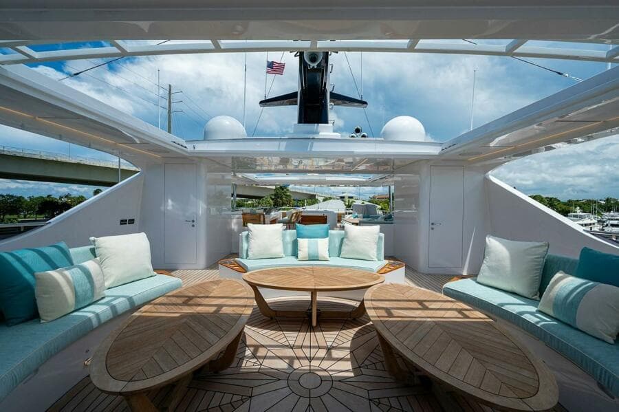 Luxurious 2020 Majesty 140 yacht interior with elegant seating and wooden accents.