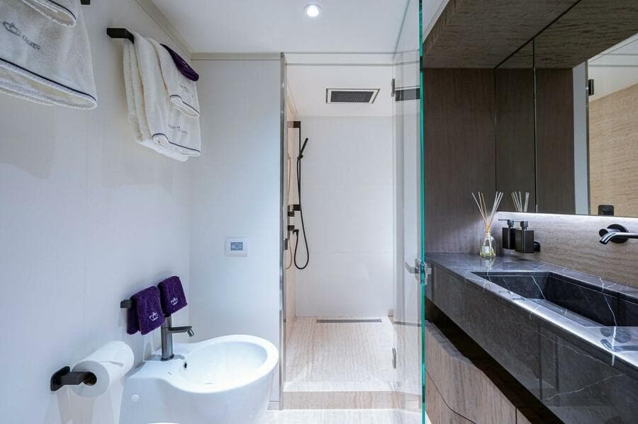 Luxurious bathroom in 2020 Majesty 140 yacht with modern fixtures and elegant design.