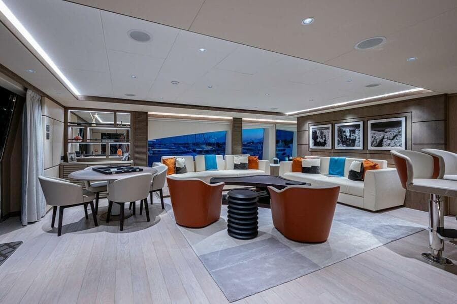Luxurious interior of 2020 Majesty 140 yacht with modern seating and elegant decor.