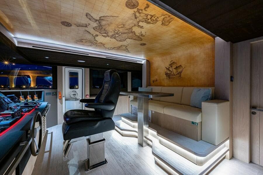Luxurious 2020 Majesty 140 yacht interior with map ceiling and modern seating.