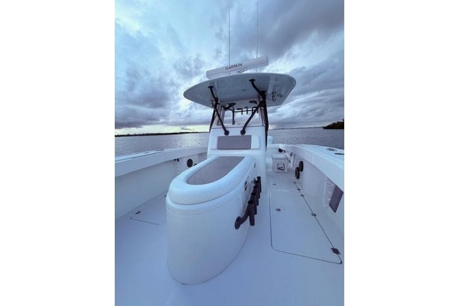 2019 Freeman 34 boat on water under cloudy sky, featuring sleek design and modern equipment.
