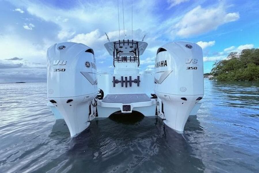 2019 Freeman 34 boat with twin Yamaha V8 350 engines on water.