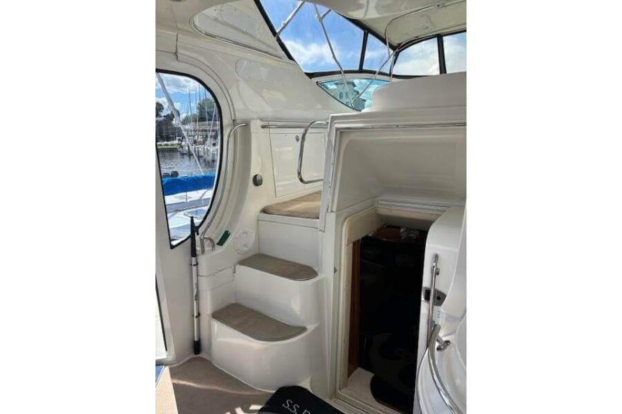 Interior view of 2004 Carver 466 Motor Yacht, featuring stairs and cabin entrance.