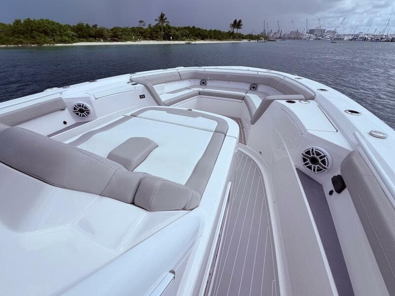 2024 Scout 400 LXF boat interior with luxurious seating and ocean view.