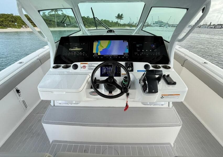 2024 Scout 400 LXF boat helm with advanced navigation system and sleek design.
