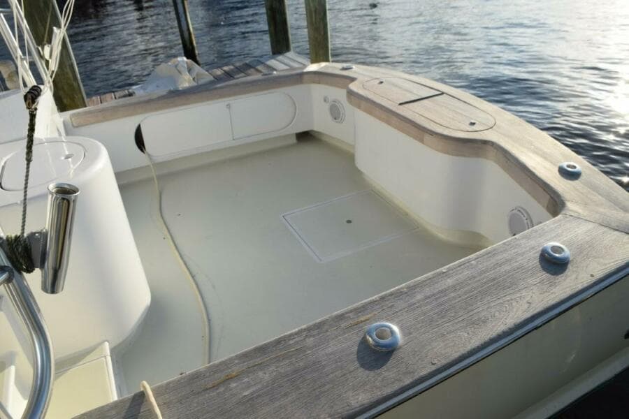 Non-Skid Cockpit Deck And Teak Coverboards And Coaming With Transom Fish Box.