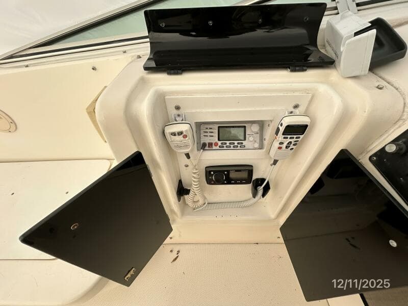 47' Bayliner flybridge helm electronics locker
