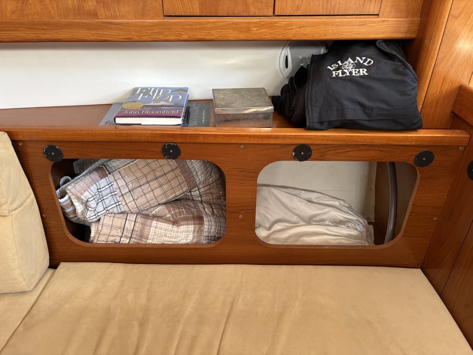 Storage beneath and behind the salon seating